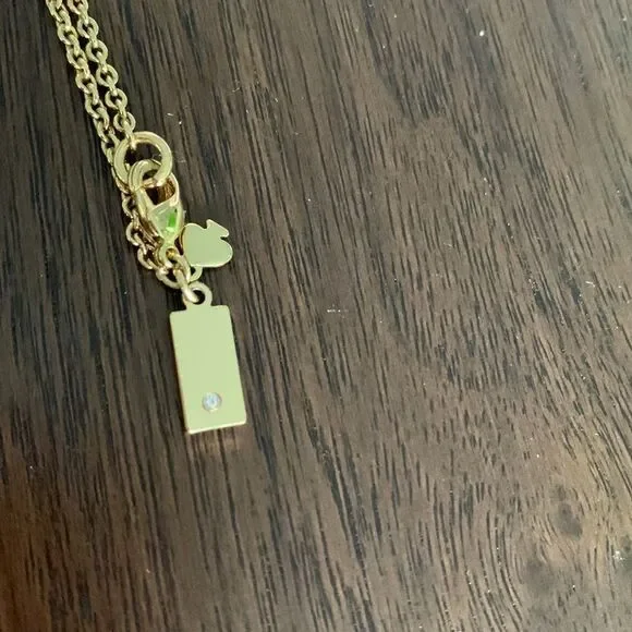 KATE Spade enamel/gold bow gold tone chain necklace